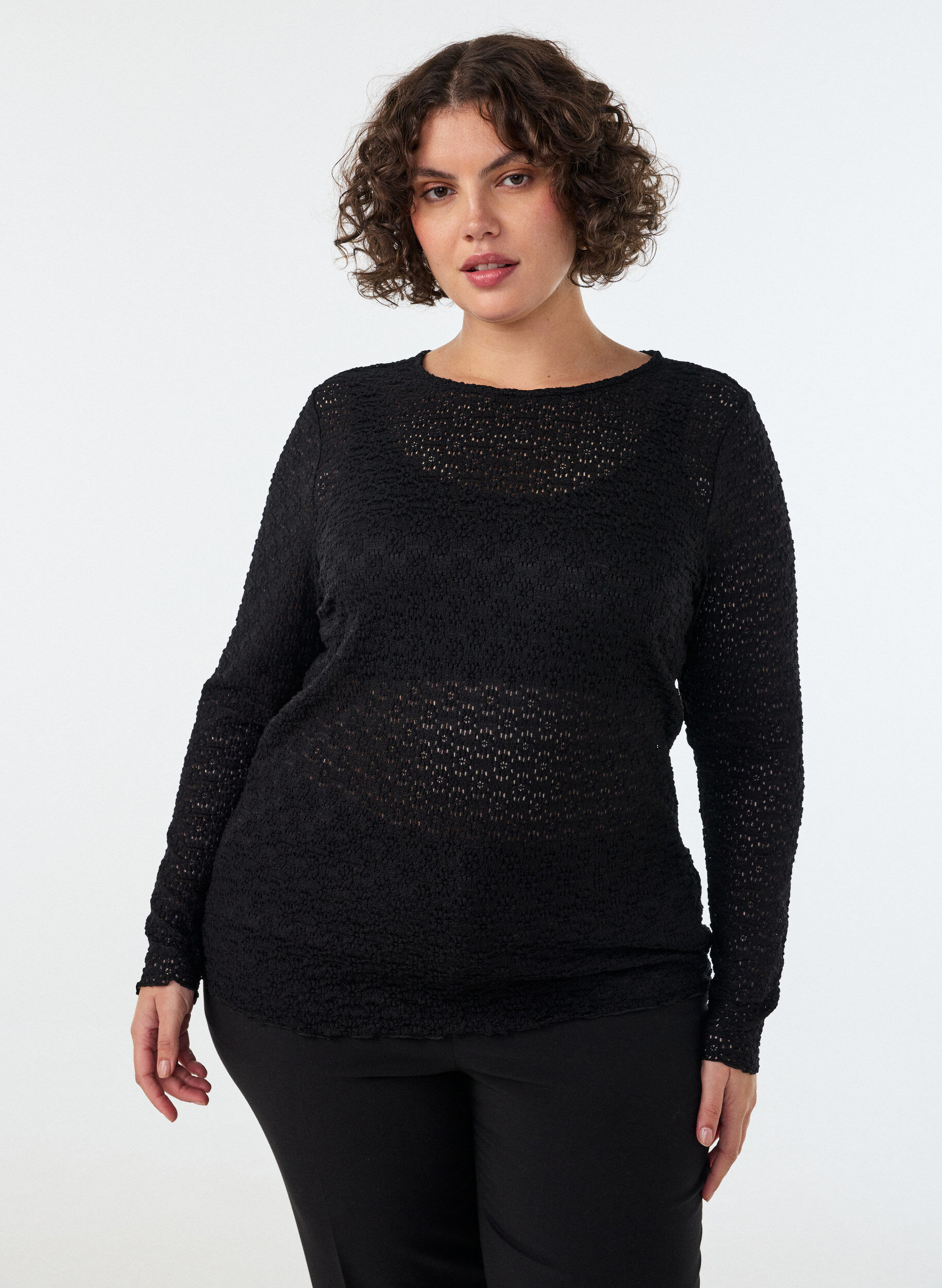 Blus med h&aring;lm&ouml;nster och l&aring;nga &auml;rmar, Svart, Model