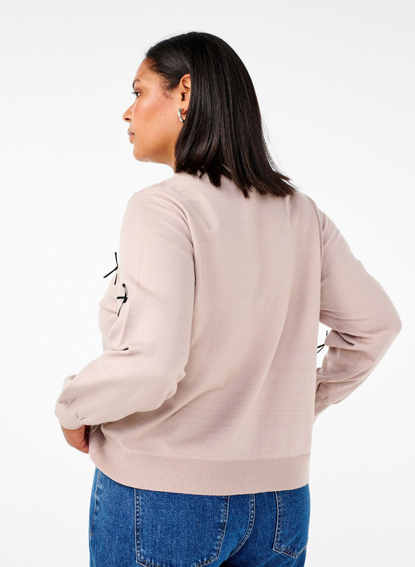 Stickad kofta med rosetter, Simply T. Black Bows, Model image number 1