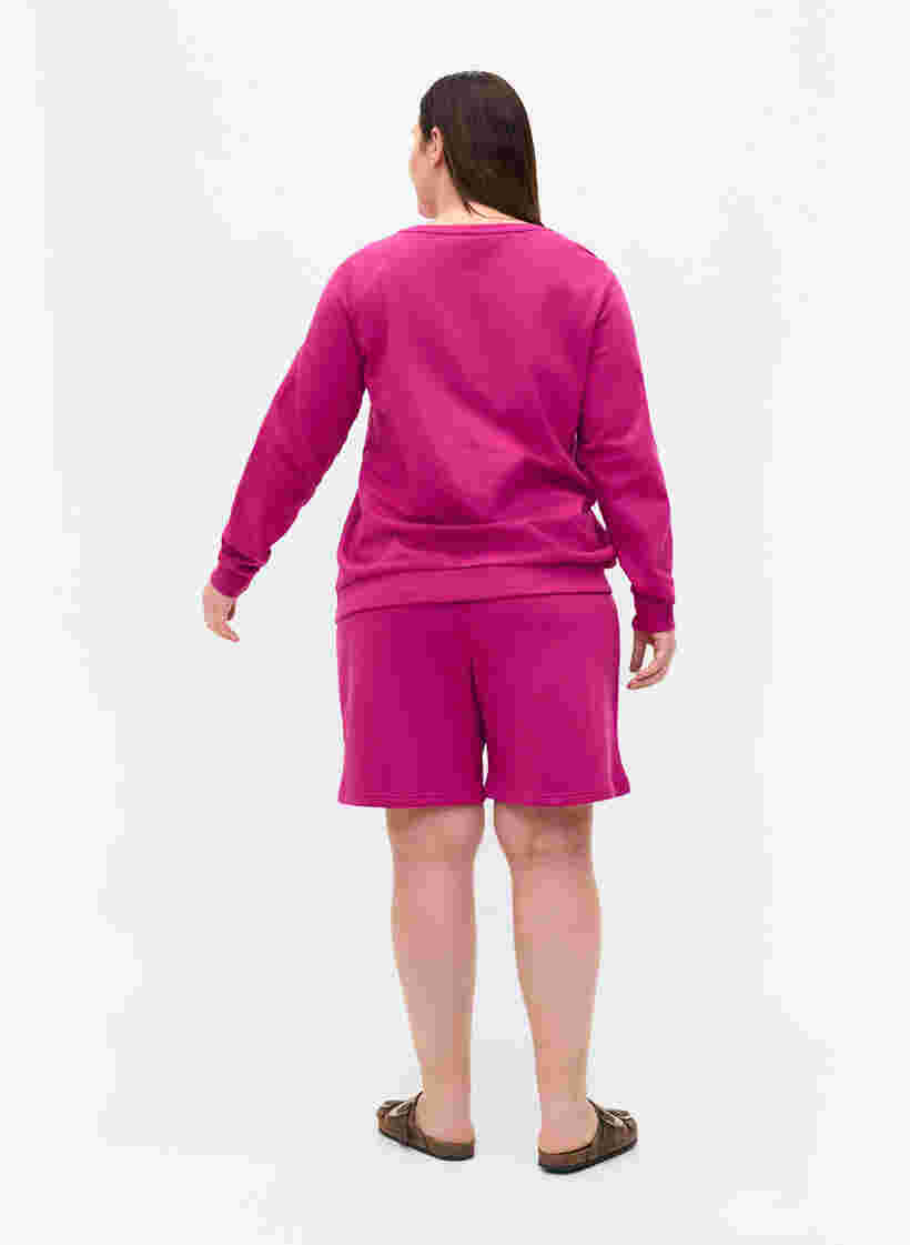 Shorts i sweatshirtmaterial med texttryck, Festival Fuchsia, Model