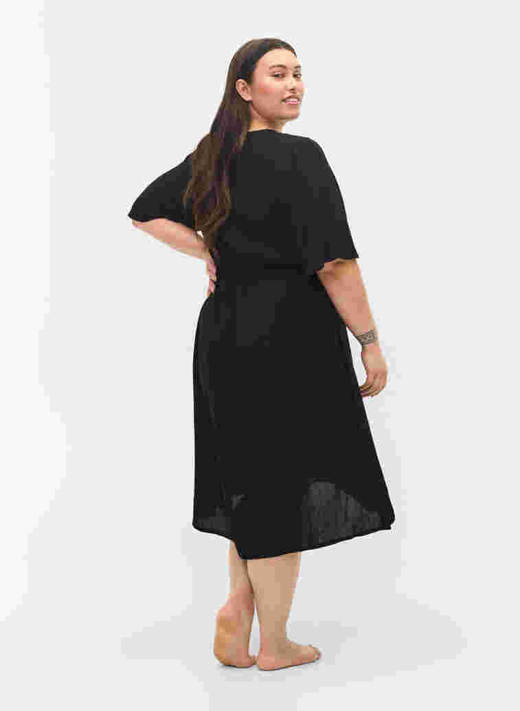 Strandklänning i viskos med dragsko i midjan, Black, Model image number 1