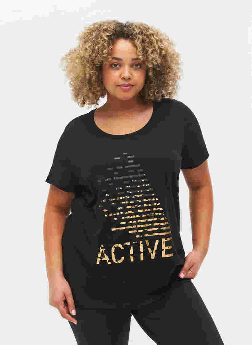  T-shirt till träning med print, Black gold foil logo, Model image number 0