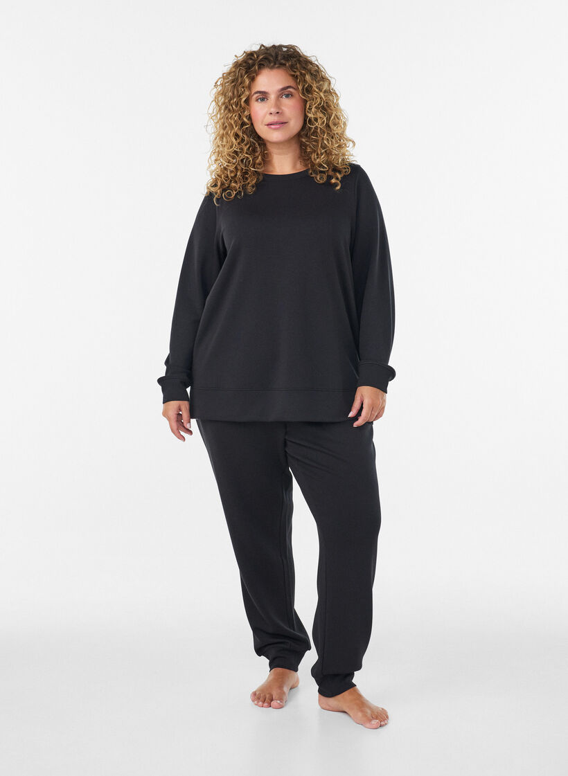 L&aring;ng&auml;rmad blus i jersey med rund hals, Svart, Model image number 1