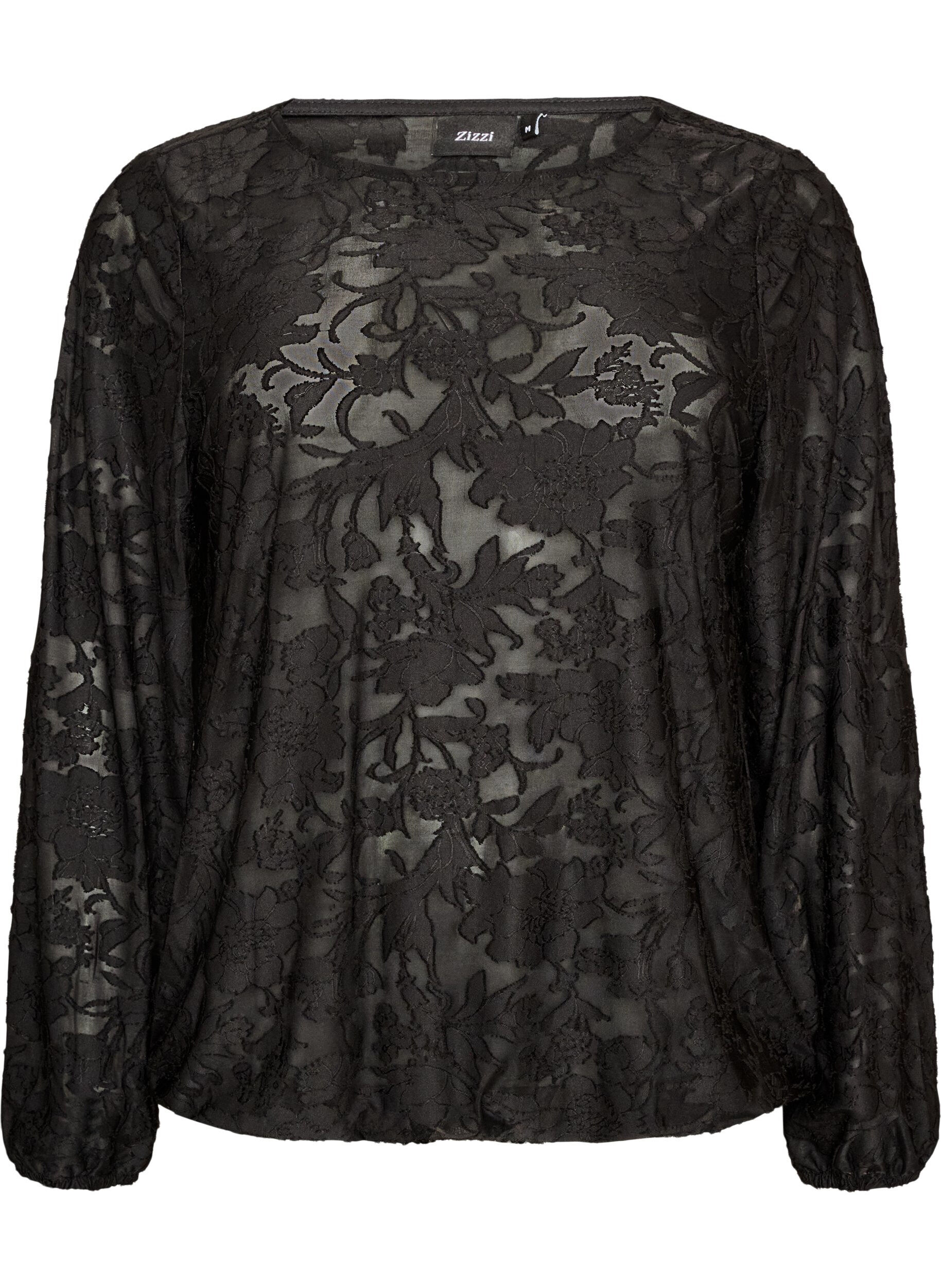 Skir blus med blommig textur och l&aring;nga &auml;rmar