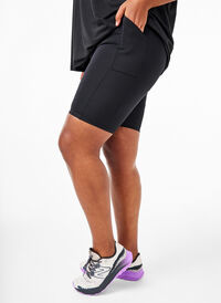 Åtsittande shorts med hög midja och fickor, Black, Model