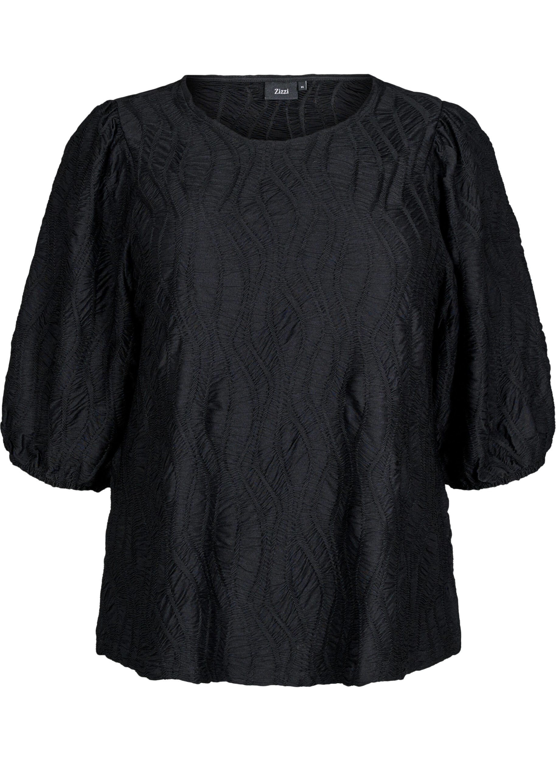 Blus med struktur och 3/4-&auml;rmar
