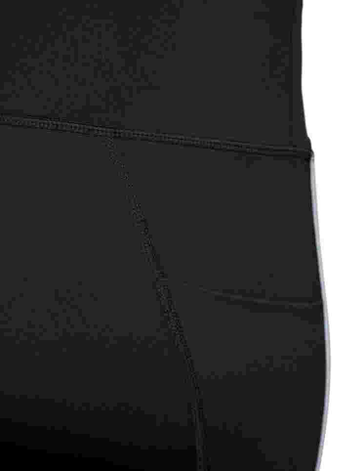 Träningstights med reflexer och sidoficka, Black, Packshot image number 3