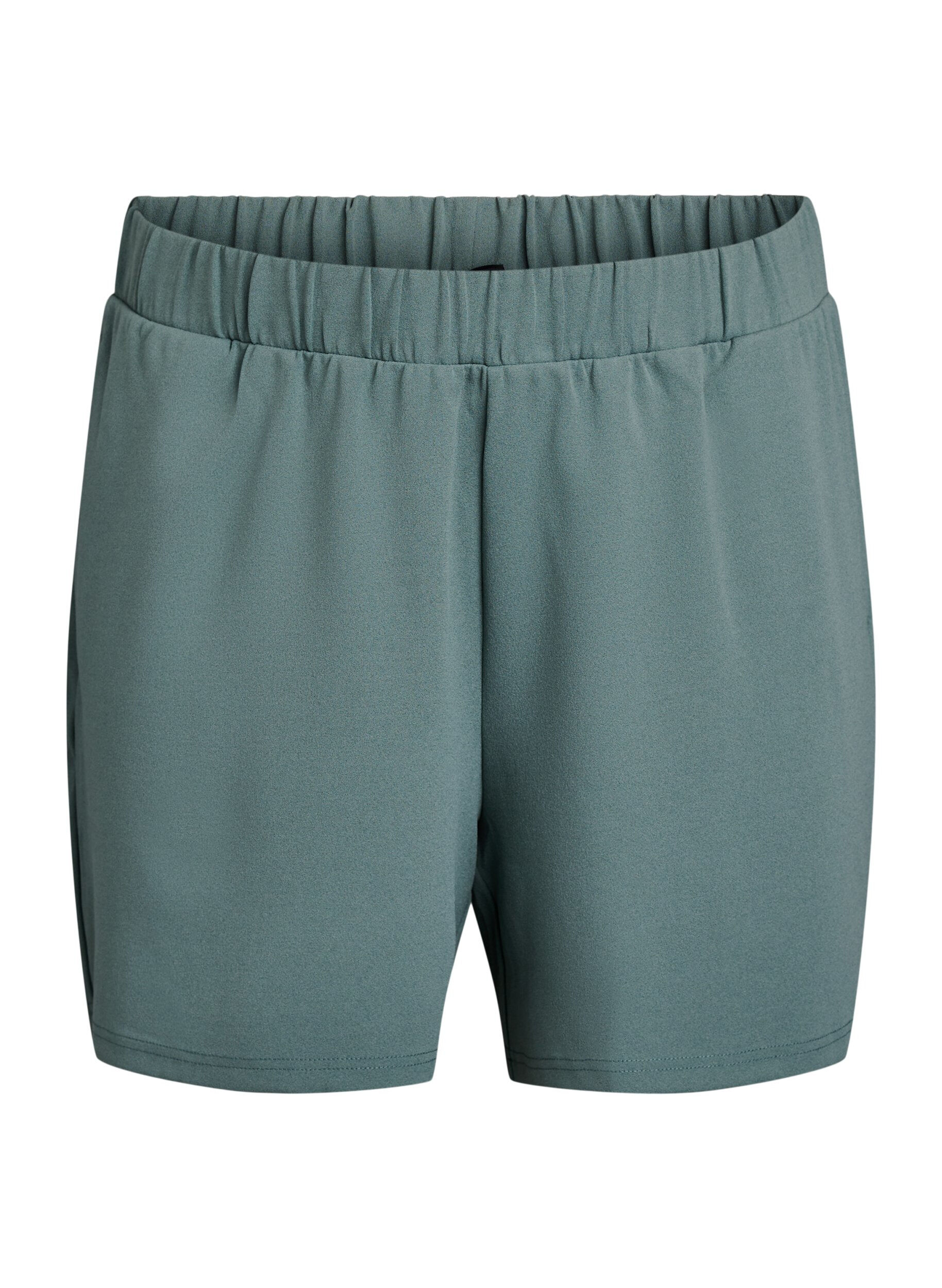 FLASH - L&ouml;st sittande shorts med fickor