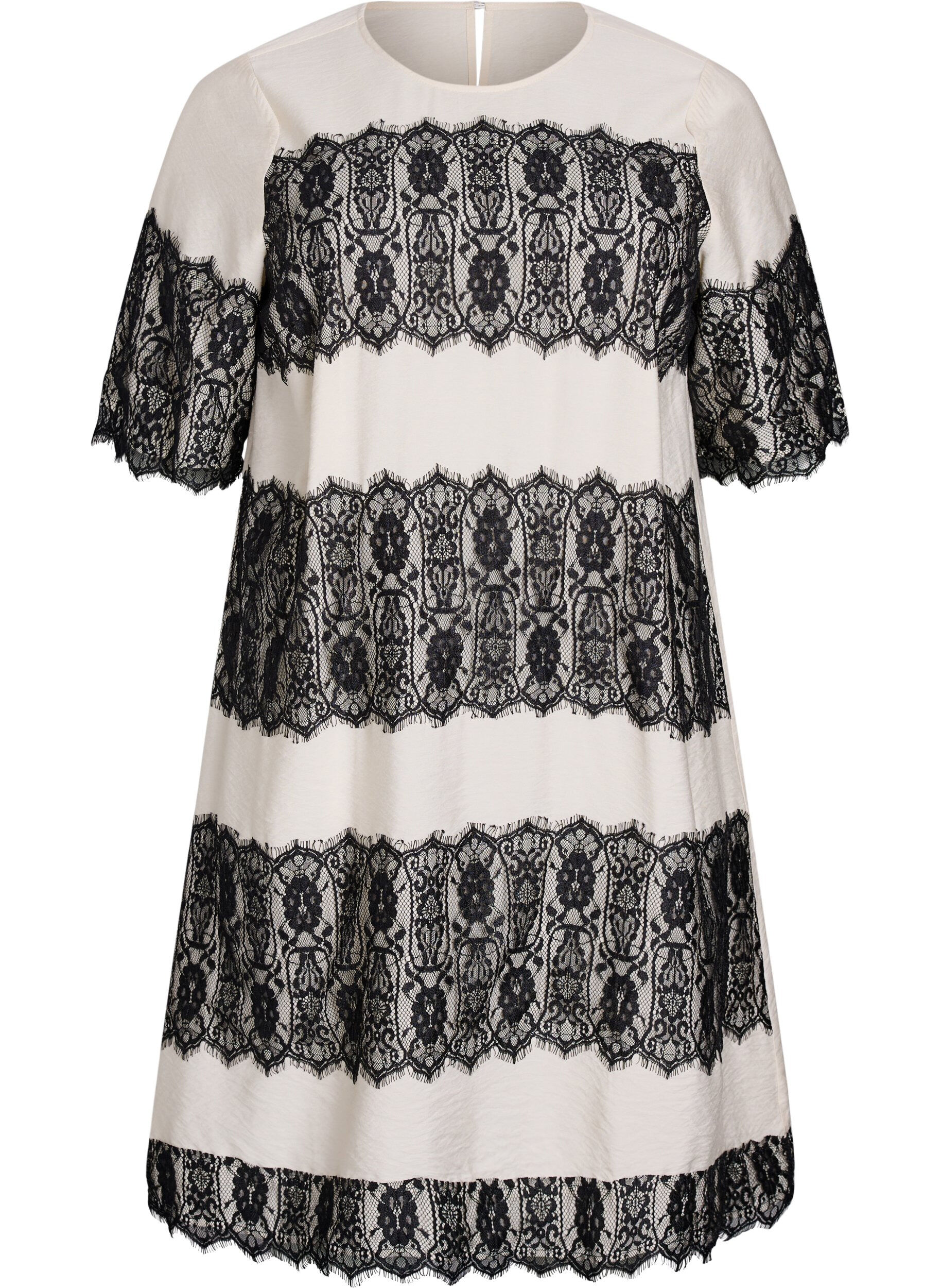 Kort kl&auml;nning med kontrasterande spetspaneler