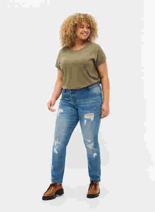 Emily jeans med slitningar och normal midjehöjd