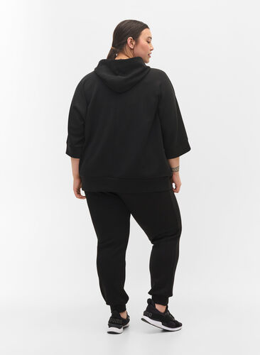 Lösa sweatpants med fickor, Black, Model image number 1