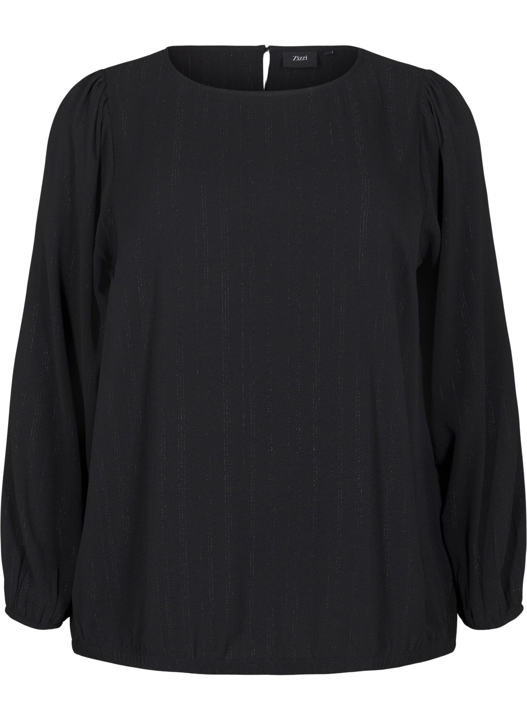 Blus med silverglitter