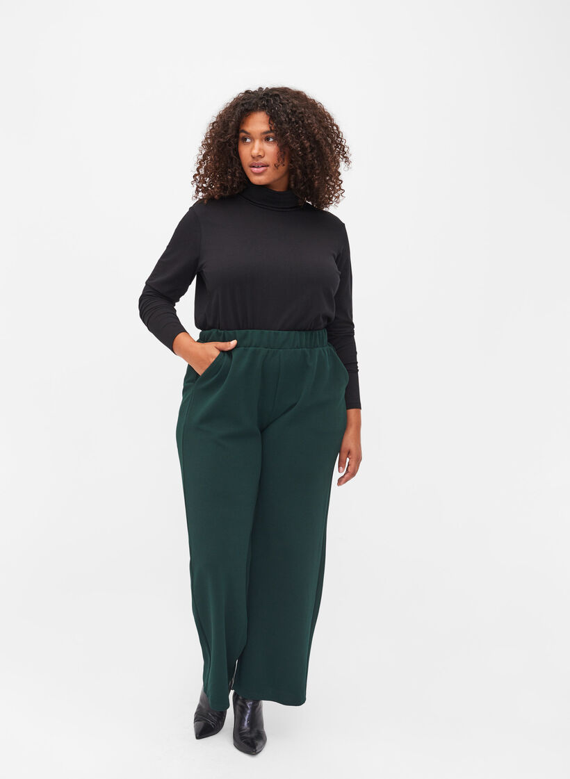 Långärmad polotröja i bomull, Solid Black, Model image number 2