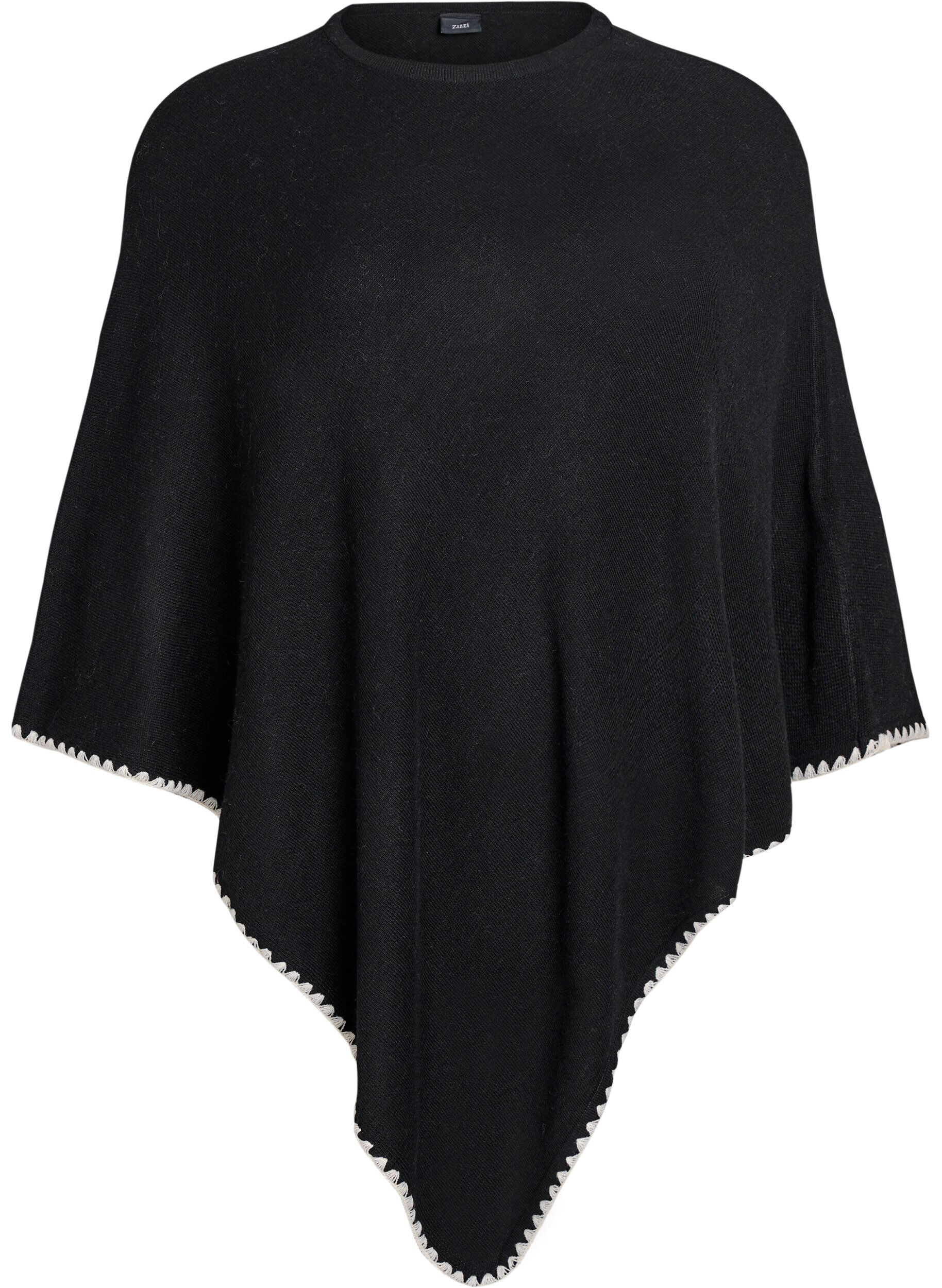 Fin stickad poncho