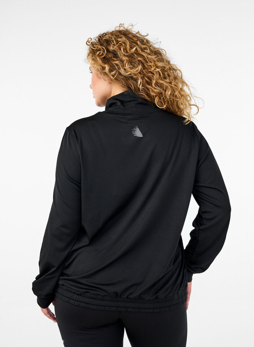 Träningslinne med hög halsringning, Black, Model image number 1