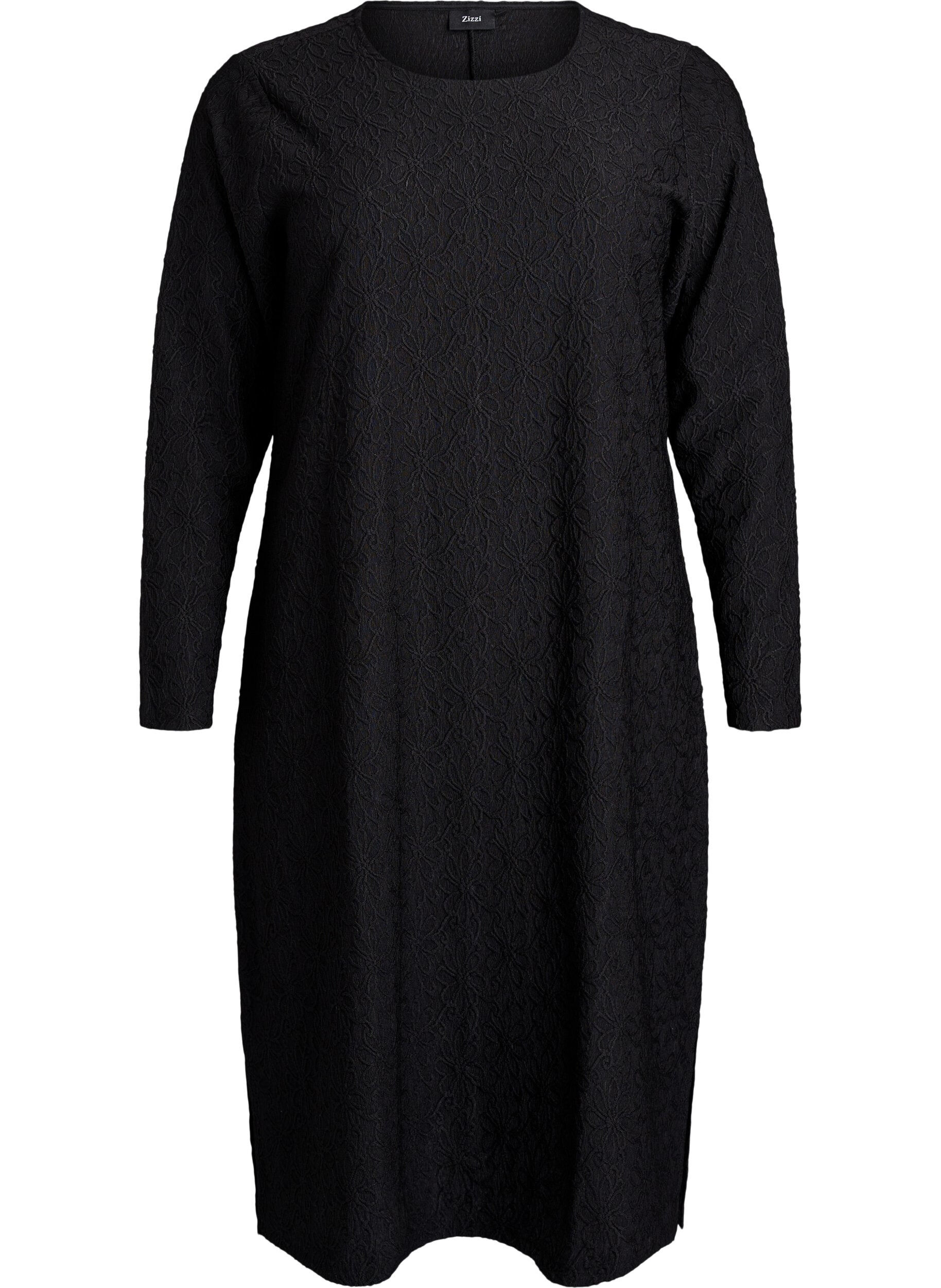 Blommig texturerad kl&auml;nning med l&aring;nga &auml;rmar