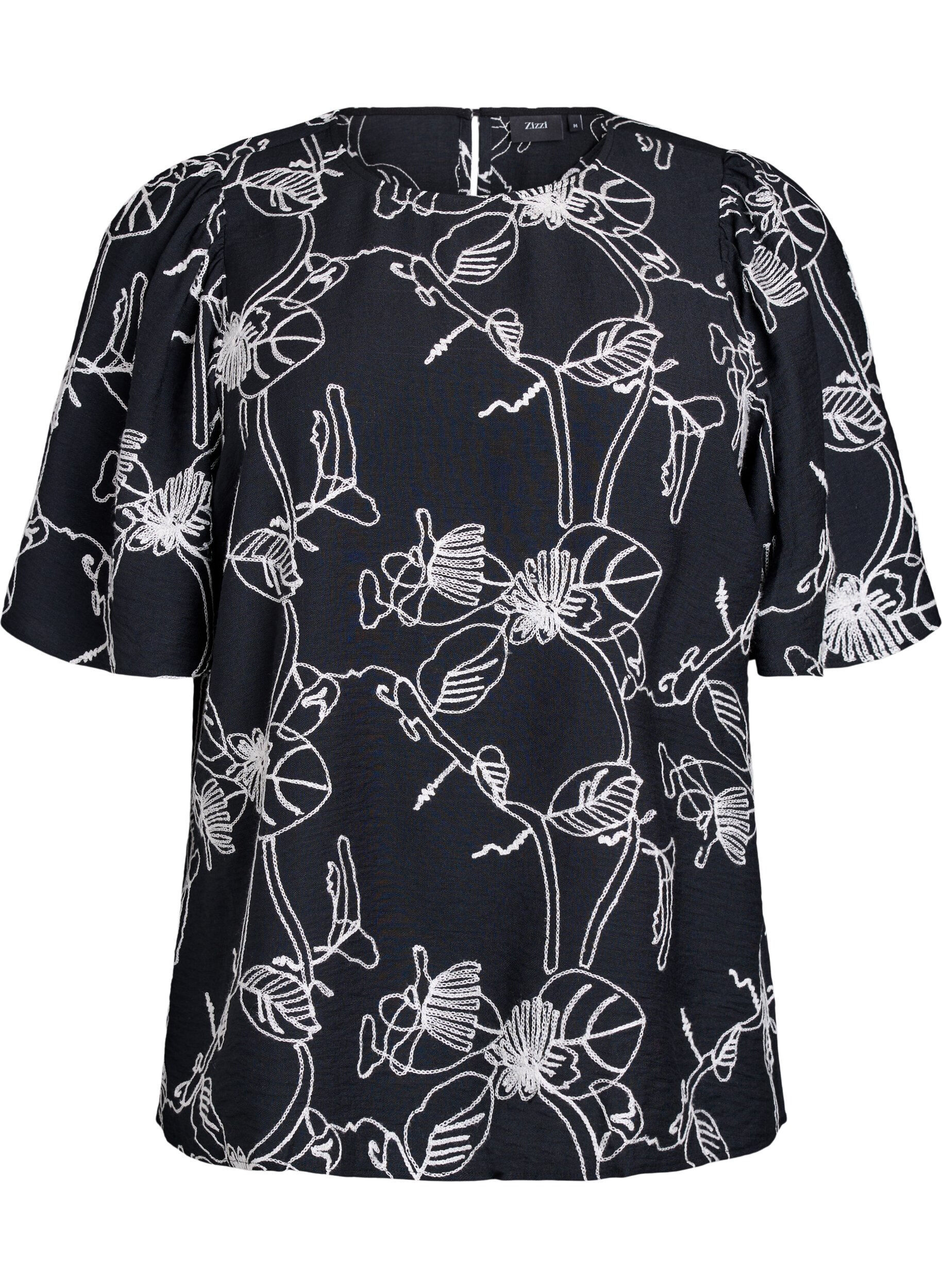 Kort&auml;rmad blus med broderat m&ouml;nster