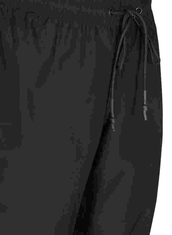 Regnbyxor med resår och dragsko, Black, Packshot image number 2
