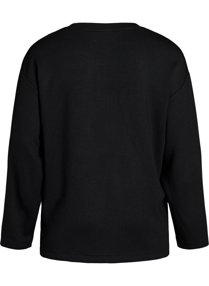 Blus i jersey med diagonal volang, Svart, Packshot image number 1