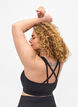 Sport-bh med korsad detalj i ryggen, Black, Model image number 1