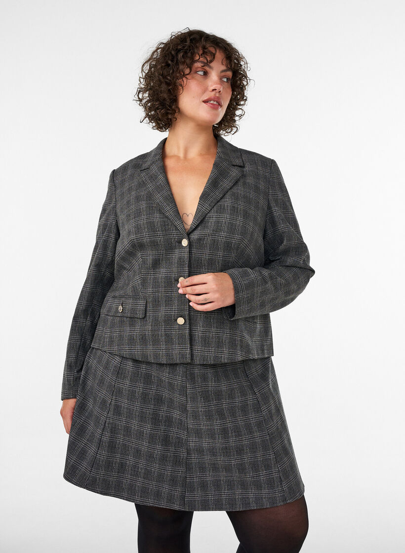 Kort a-linjeformad kjol, Gr&aring;, Model