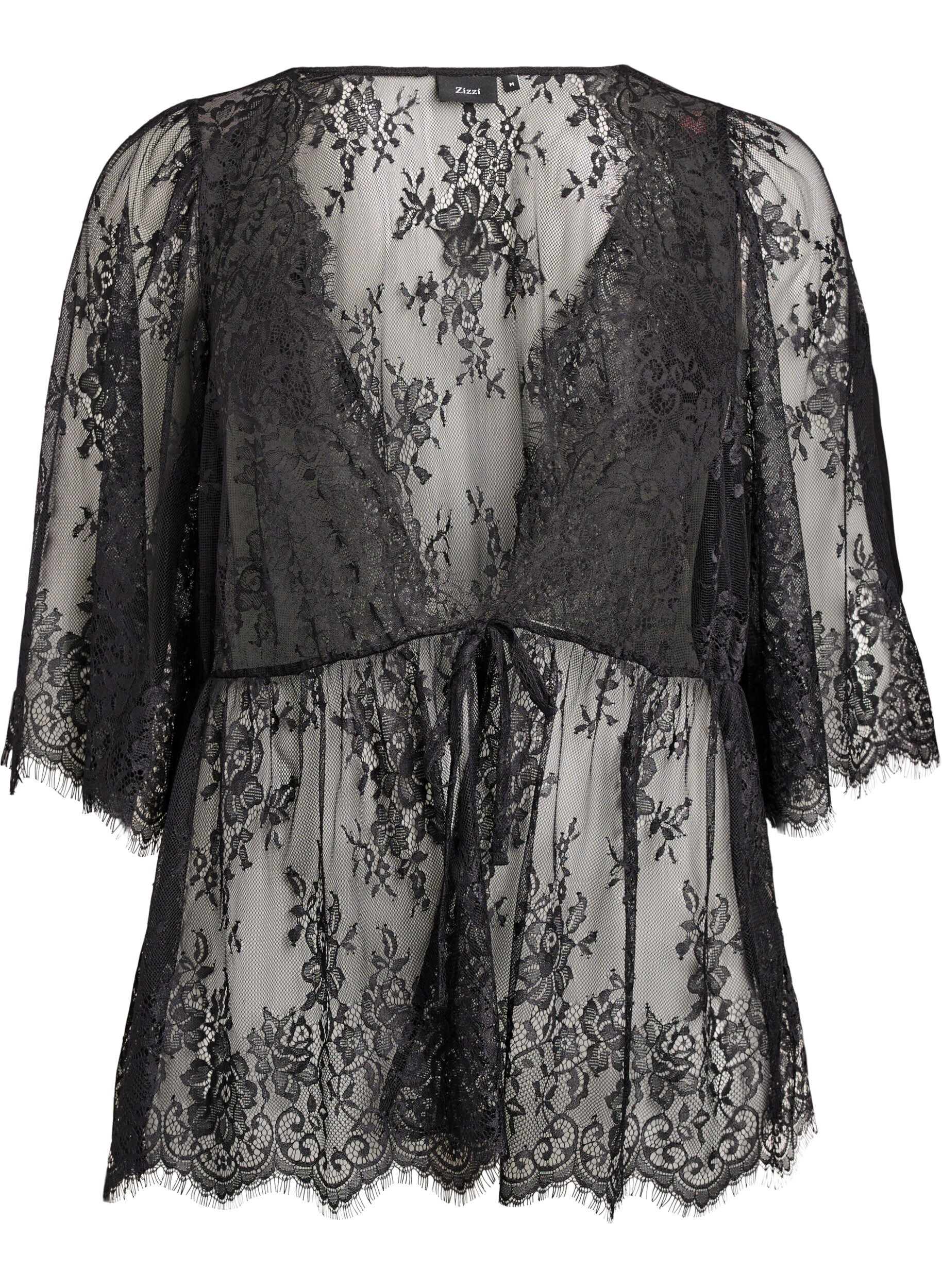 Spetstopp med knytdetalj och 3/4-&auml;rmar