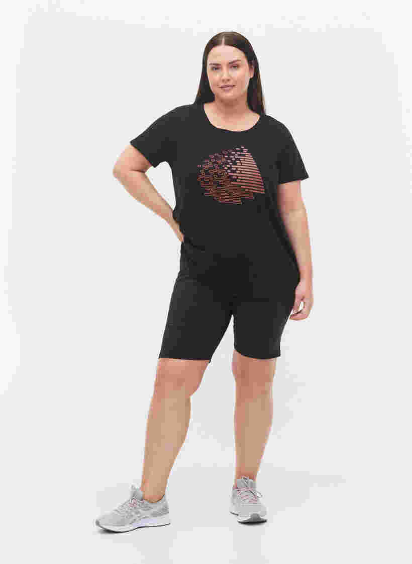  T-shirt till träning med print, Black w. Copper Foil, Model image number 2
