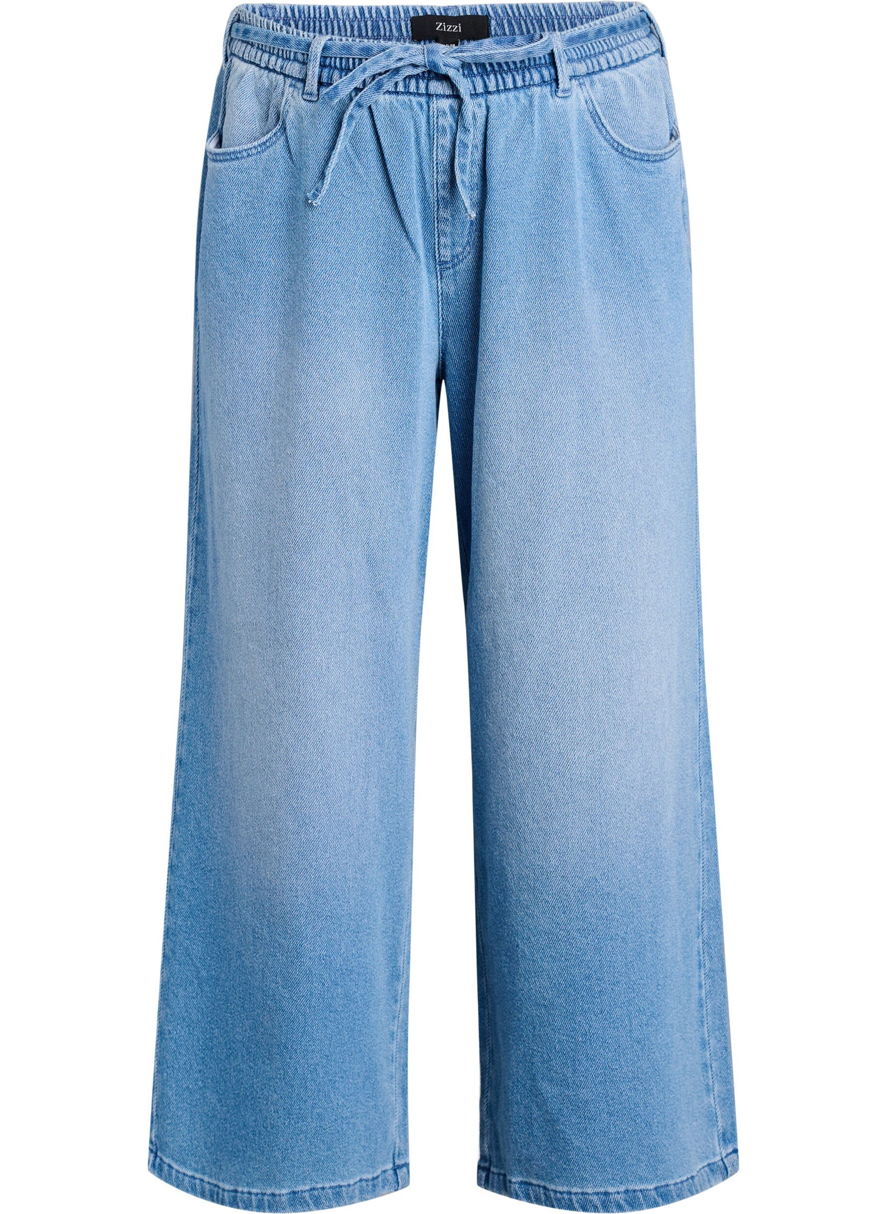 Jeans med l&ouml;s passform, res&aring;r och dragsko