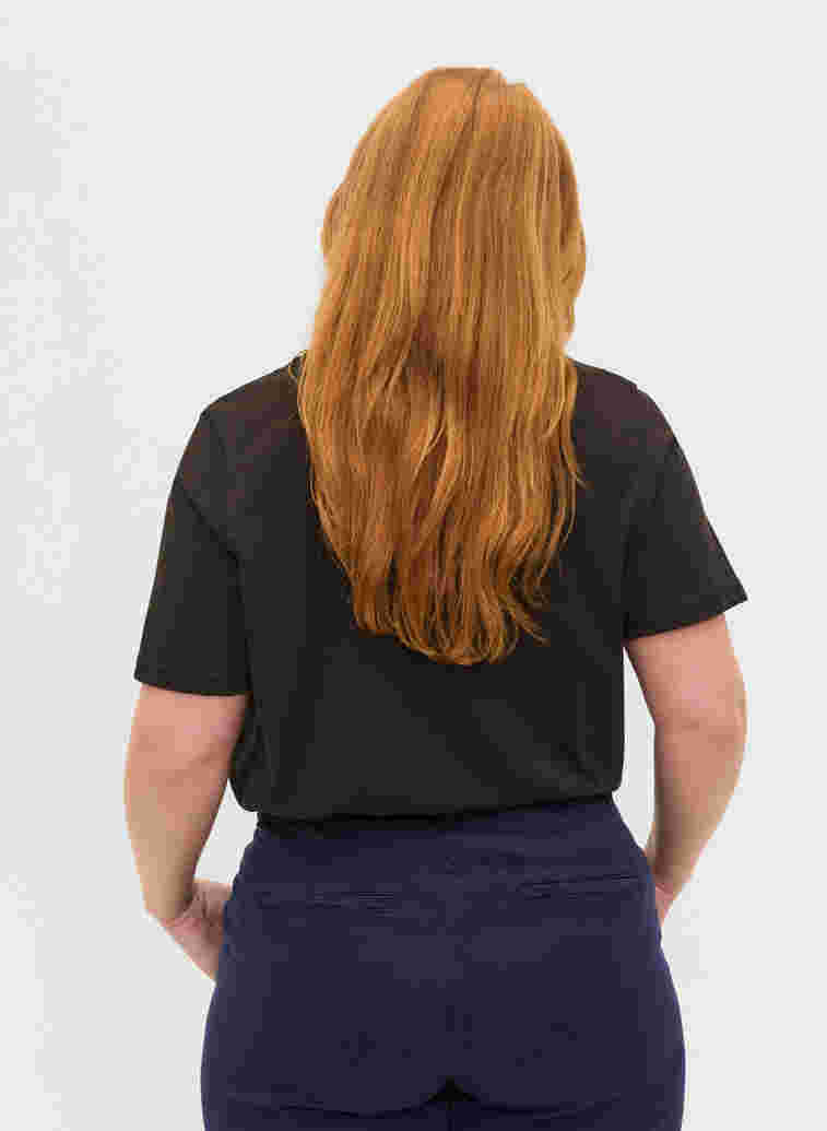 Kortärmad t-shirt i bomull med print, Black, Model image number 1