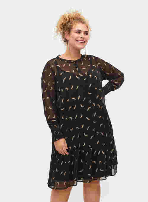 A-linjeformad klänning  med smock i ärm