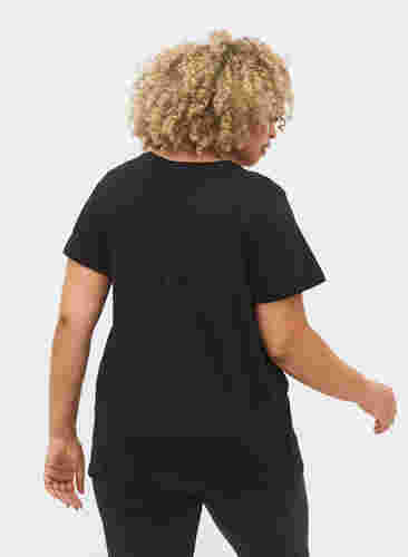 T-shirt till träning med print, Black gold foil logo, Model image number 1