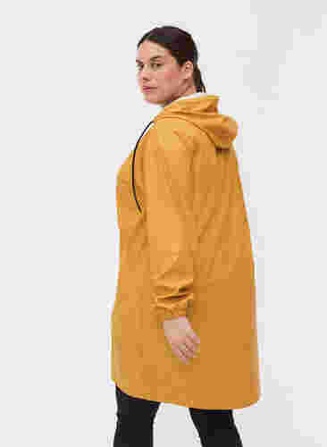 Regnjacka med huva och knappar, Spruce Yellow, Model image number 1