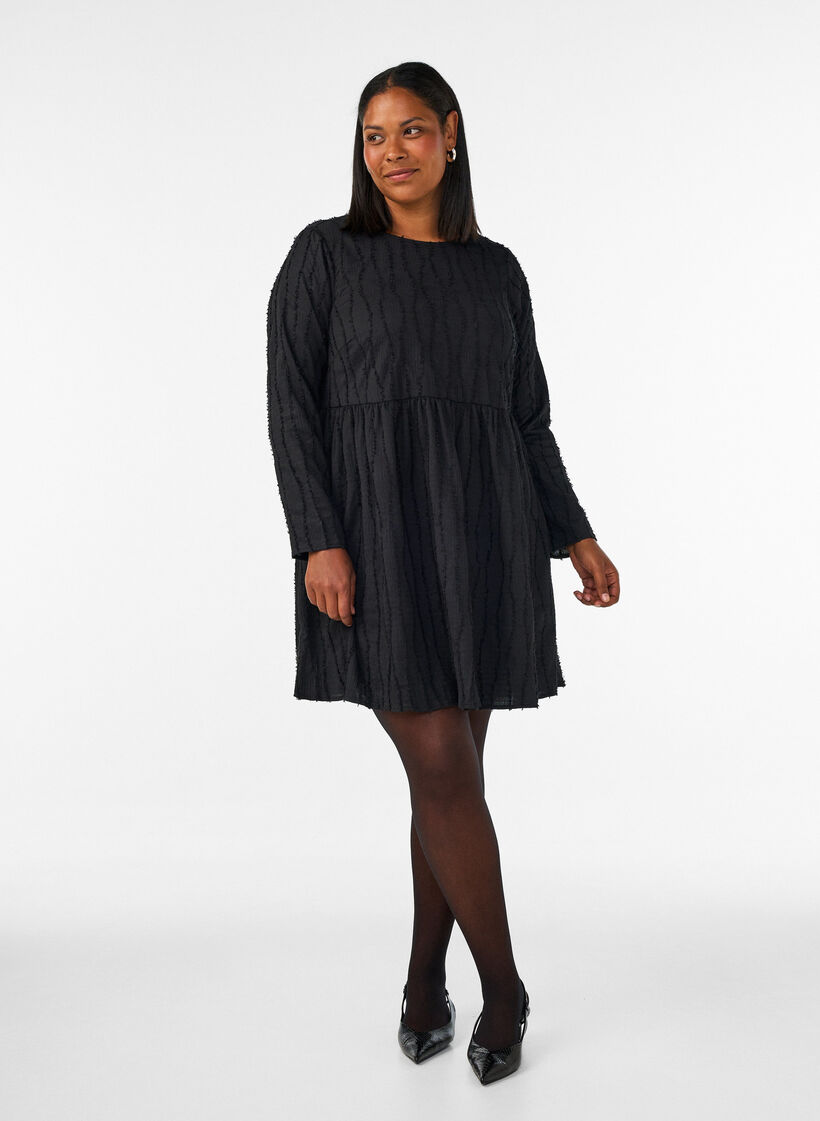 Kort kl&auml;nning i jersey med v&aring;gigt strukturm&ouml;nster, Svart, Model image number 1