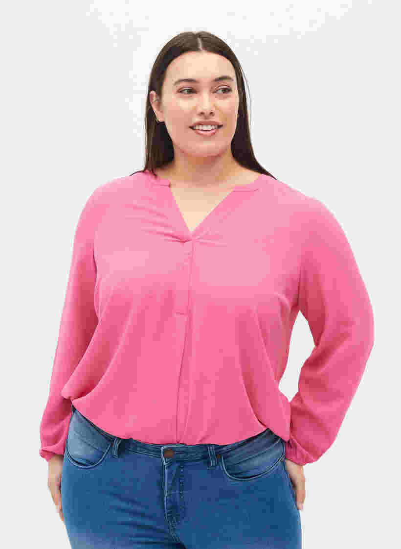 Enfärgad blus med v-hals, Shocking Pink, Model