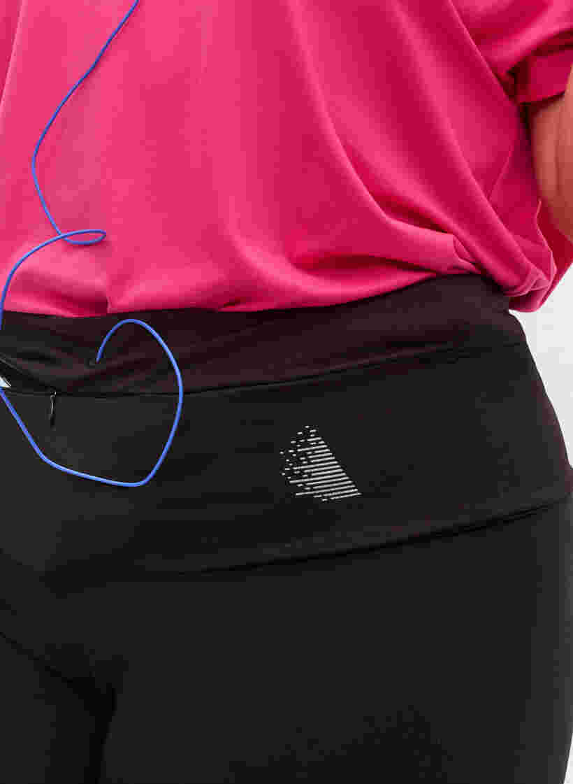 Löparbälte med reflex och fickor, Black, Model image number 1