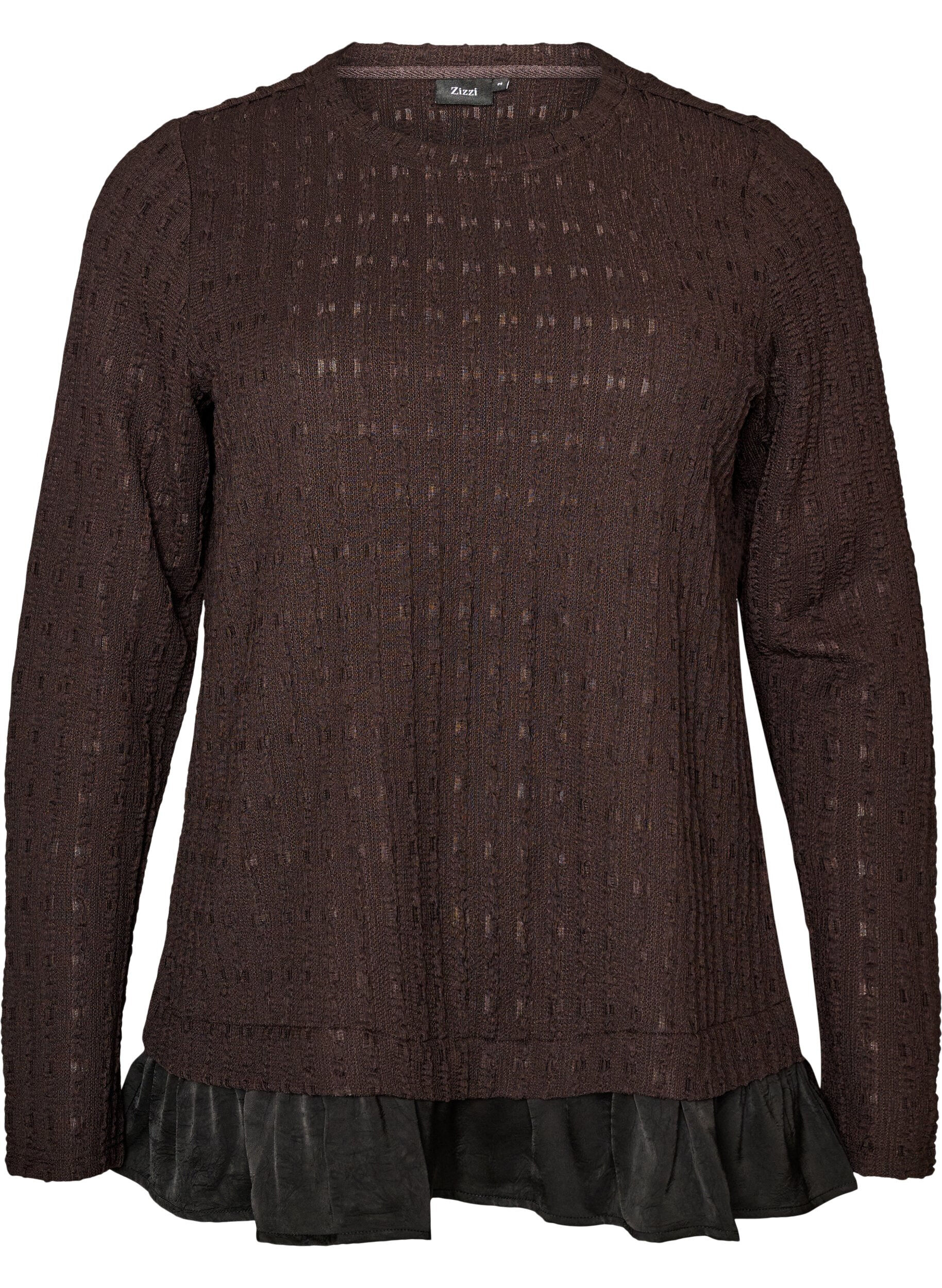 Strukturerad blus med volangkant