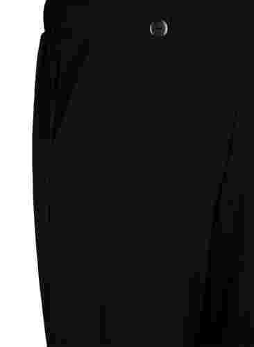 Lösa byxor med fickor, Black, Packshot image number 2