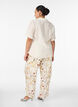 H&ouml;gmidjade byxor i viskos med blommigt m&ouml;nster, Beige, Model image number 1
