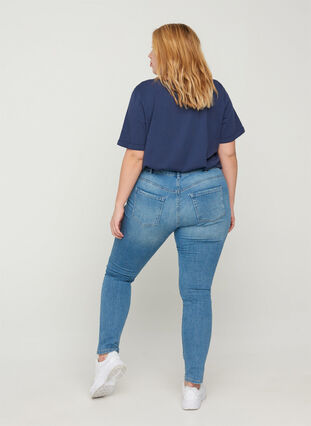 Extra slim Sanna jeans med slitna detaljer, Light blue denim, Model image number 1