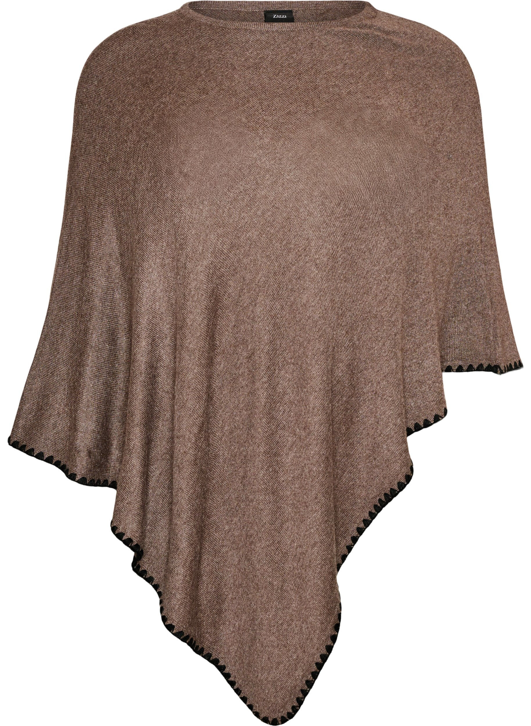 Fin stickad poncho