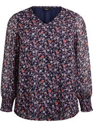 Blus med blomm&ouml;nster och glittertr&aring;d, Bl&aring;