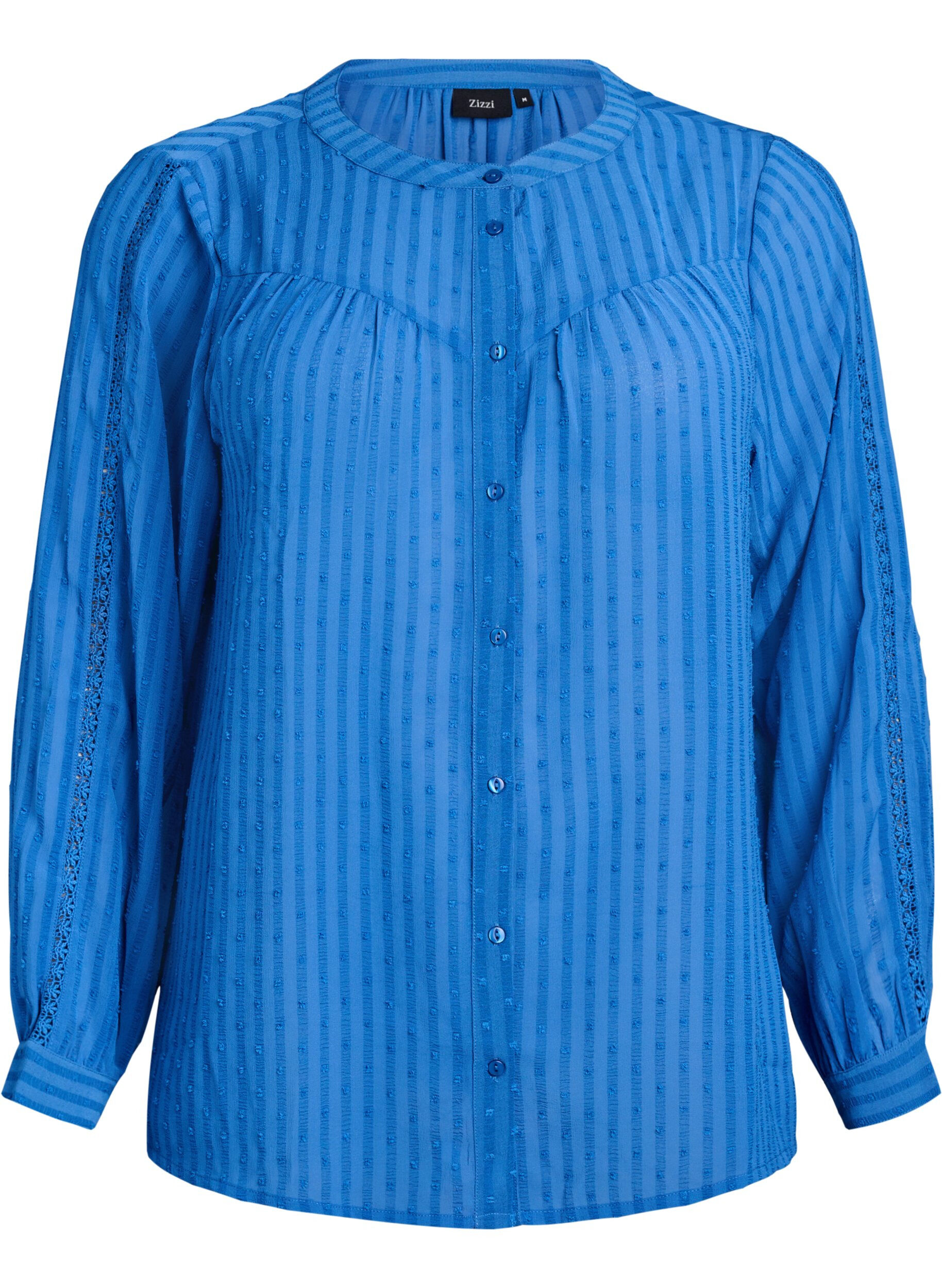 Skjorta med strukturerat prickm&ouml;nster och broderidetaljer