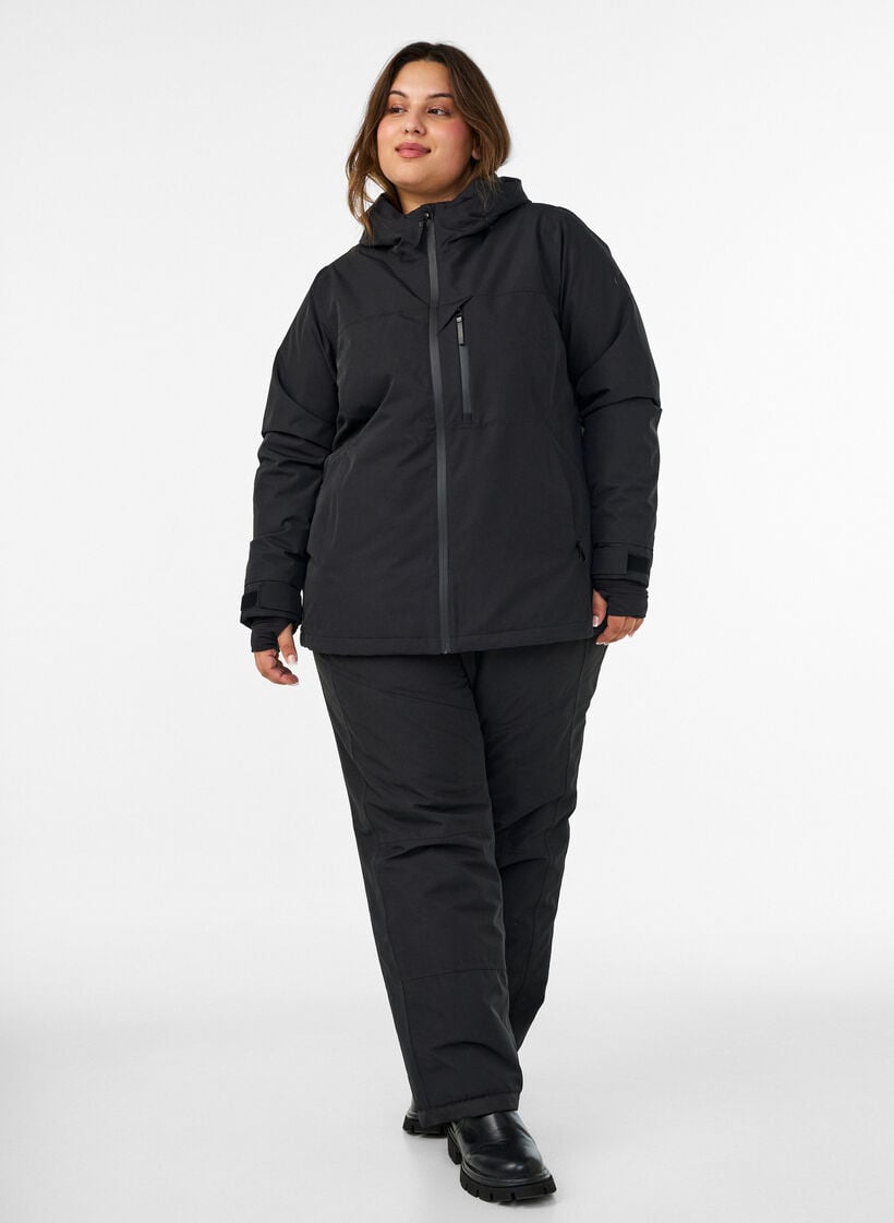 Skidjacka med huva och fickor med dragkedja, Svart, Model image number 1