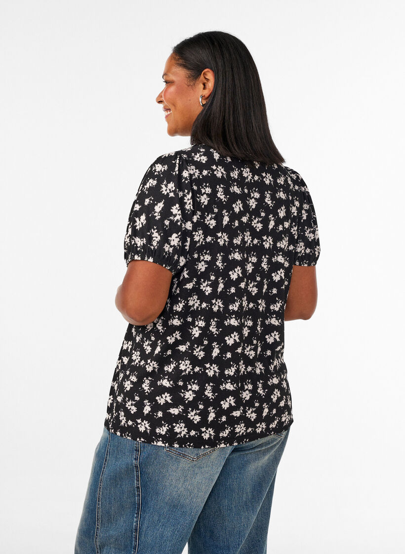 Blus med l&aring;nga &auml;rmar och blommigt tryck, Svart, Model image number 2