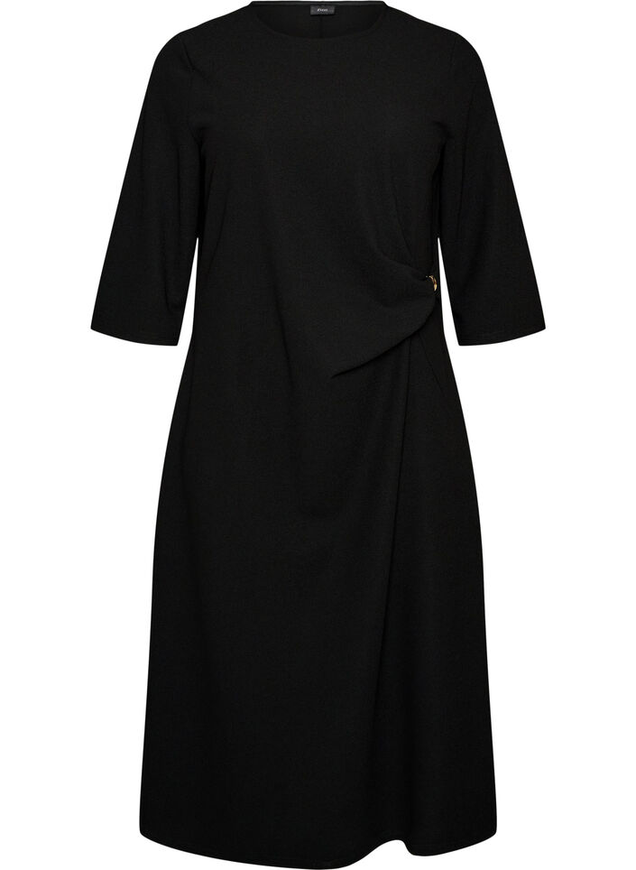 Kl&auml;nning i jersey med drapering och dekorativt sp&auml;nne, Svart, Packshot image number 0