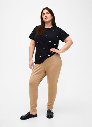 T-shirt i ekologisk bomull med rosetter, Black W. Bow Emb. , Model image number 2