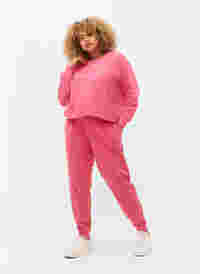 Sweatpants med tryck och fickor, Hot Pink AOP, Model