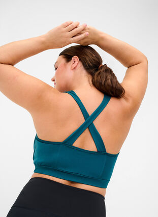 Enfärgad sport-bh med korsad rygg, Deep Teal, Model image number 1
