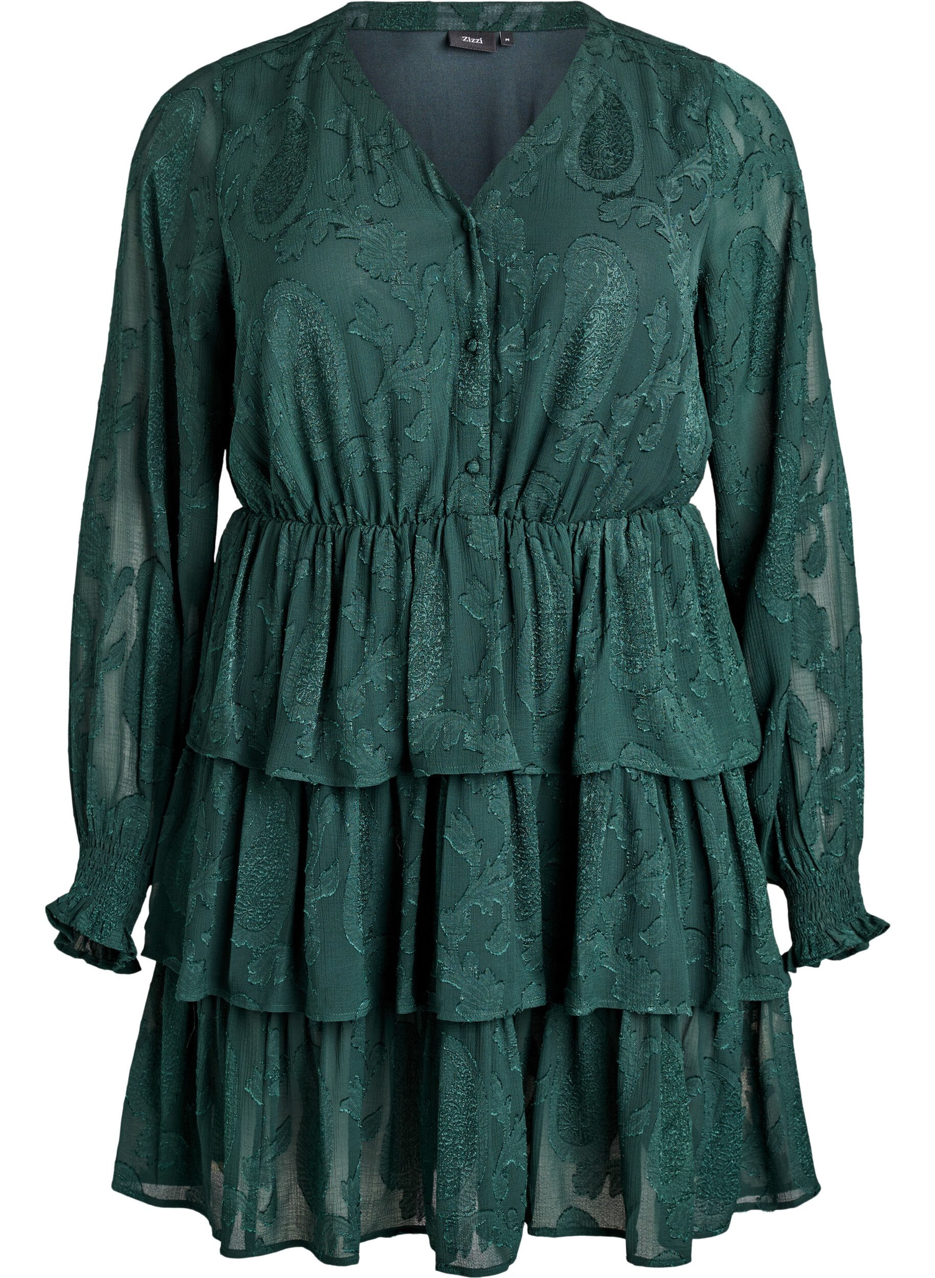 Kort kl&auml;nning med volanger och strukturm&ouml;nster