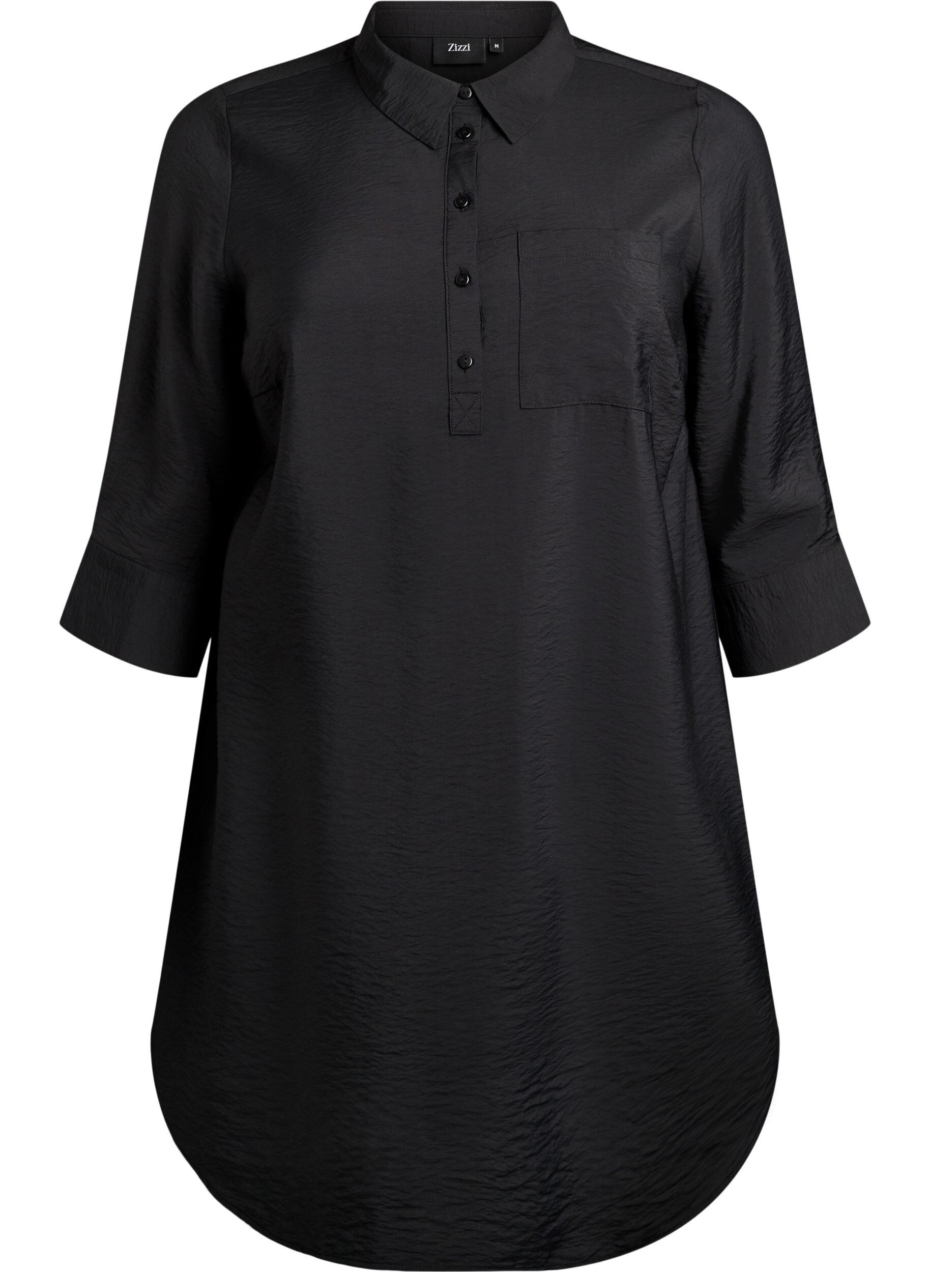 Kort kl&auml;nning med krage och br&ouml;stficka