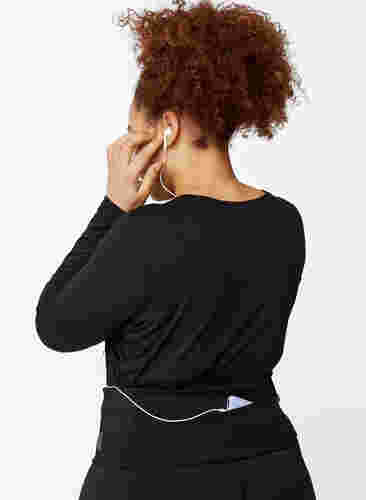 Löparbälte med fickor och dragkedjor, Black, Model image number 2